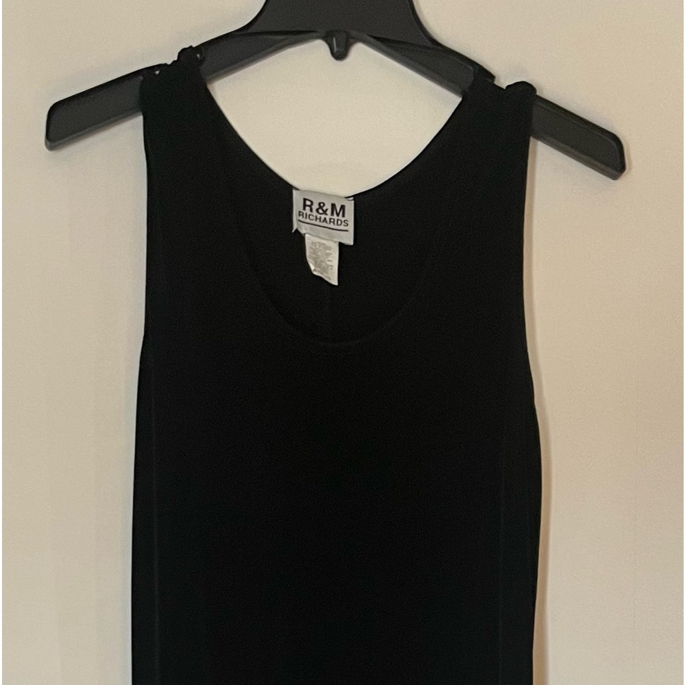Beautiful black dress, floor length, small straps.